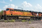 BNSF 7695, GE ES44DC, wearing experimental yellow BNSF 'Golden Swoosh' logo 